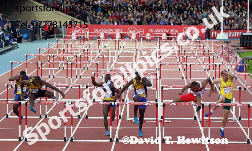 Andrew Riley (Jamaica) wins the 110 metres hurdles from Will Sharman (England) at the Commonwealth Games, Glasgow. Photo: David T. Hewitson/Sports for All Pics